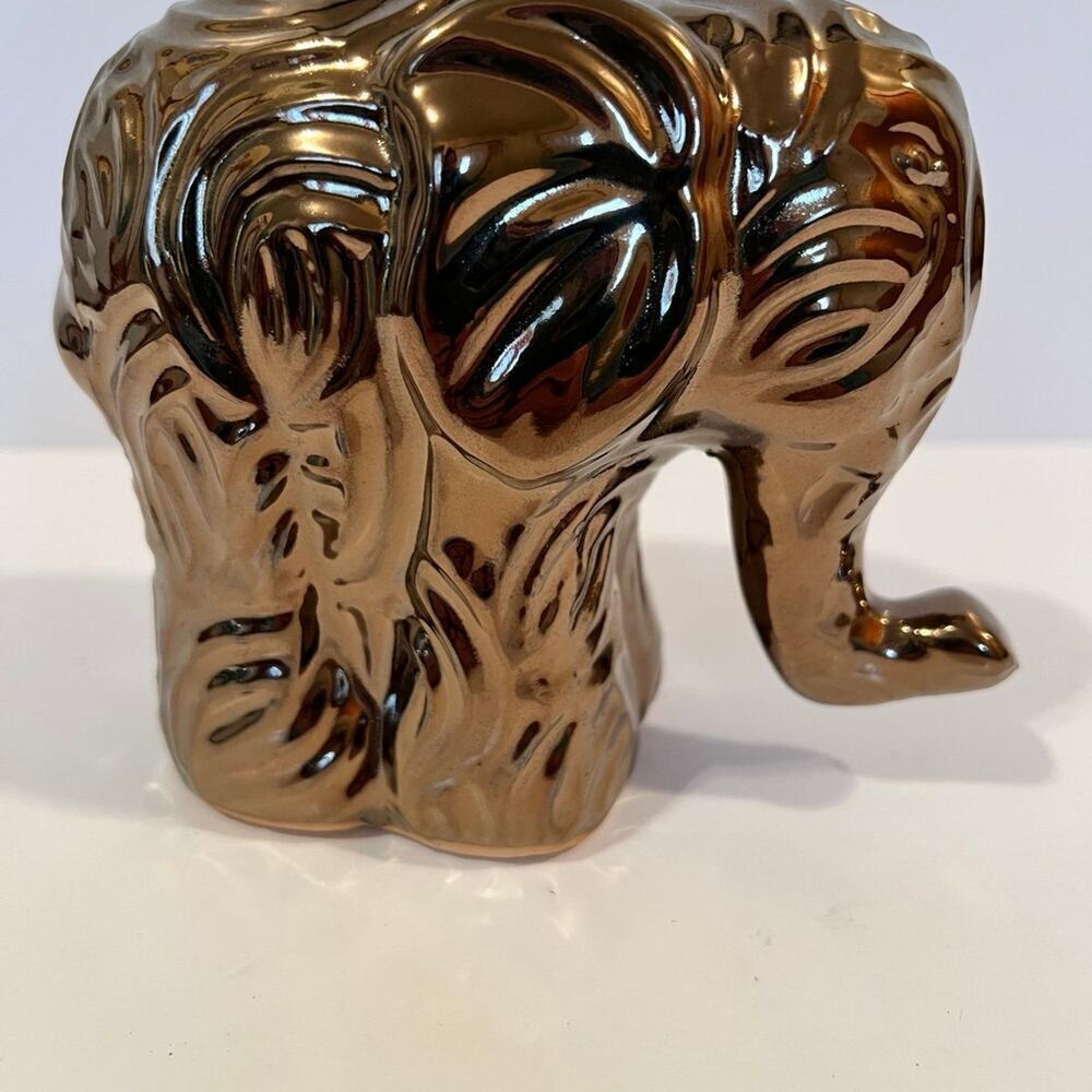 Elephan, clay gold painted figurine